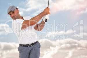 Composite image of golfplayer taking a shot