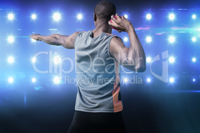 Composite image of rear view of athletic man preparing the shot
