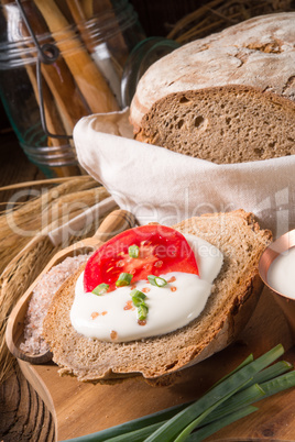 homemade bread with cream and tomato