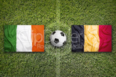 Ireland vs. Belgium flags on soccer field