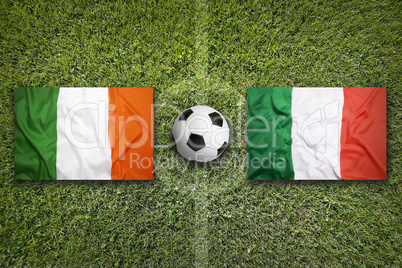 Ireland vs. Italy flags on soccer field