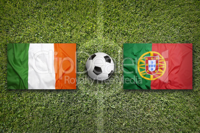 Ireland vs. Portugal flags on soccer field