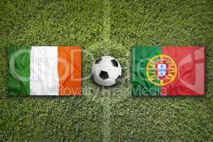 Ireland vs. Portugal flags on soccer field