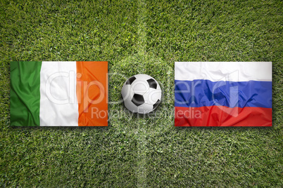 Ireland vs. Russia flags on soccer field