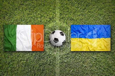 Ireland vs. Ukraine flags on soccer field