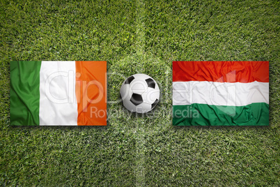 Ireland vs. Hungary flags on soccer field