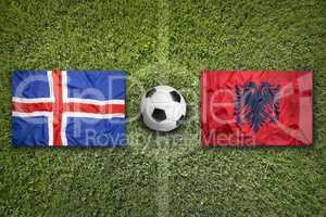 Iceland vs. Albania flags on soccer field