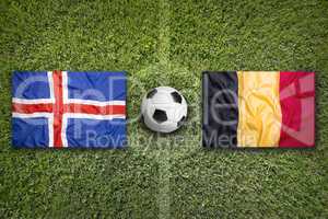 Iceland vs. Belgium flags on soccer field