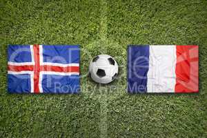 Iceland vs. France flags on soccer field