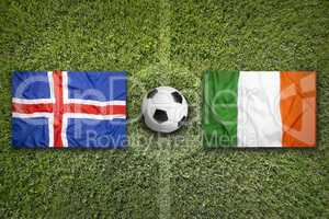 Iceland vs. Ireland flags on soccer field