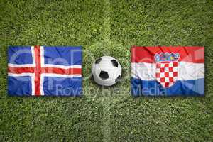 Iceland vs. Croatia flags on soccer field