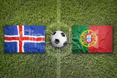 Iceland vs. Portugal flags on soccer field