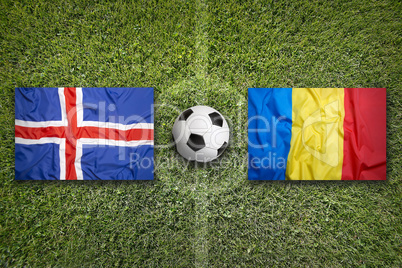 Iceland vs. Romania flags on soccer field