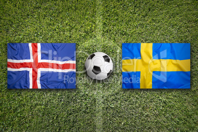 Iceland vs. Sweden flags on soccer field