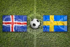 Iceland vs. Sweden flags on soccer field