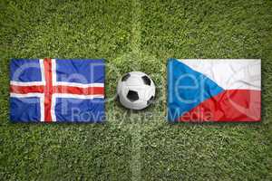 Iceland vs. Czech Republic flags on soccer field