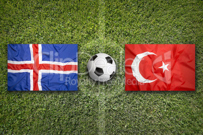Iceland vs. Turkey flags on soccer field