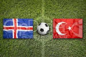 Iceland vs. Turkey flags on soccer field