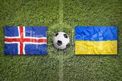 Iceland vs. Ukraine flags on soccer field