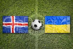 Iceland vs. Ukraine flags on soccer field