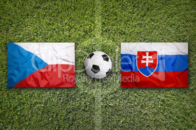 Czech Republic vs. Slovakia flags on soccer field