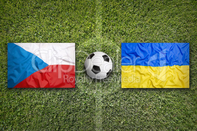 Czech Republic vs. Ukraine flags on soccer field