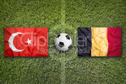 Turkey vs. Belgium flags on soccer field