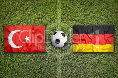 Turkey vs. Germany flags on soccer field