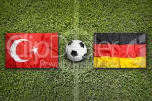 Turkey vs. Germany flags on soccer field