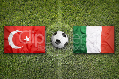 Turkey vs. Italy flags on soccer field