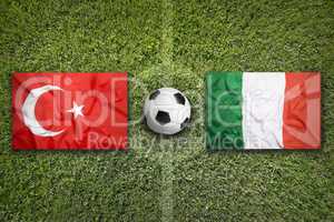 Turkey vs. Italy flags on soccer field