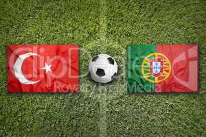 Turkey vs. Portugal flags on soccer field