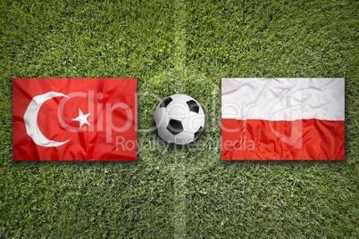 Turkey vs. Poland flags on soccer field