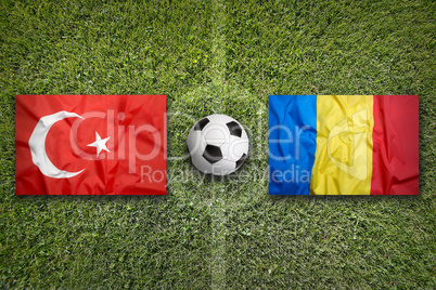 Turkey vs. Romania flags on soccer field
