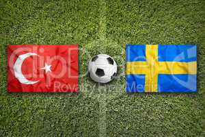 Turkey vs. Sweden flags on soccer field