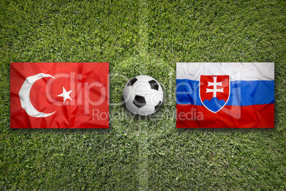 Turkey vs. Slovakia flags on soccer field