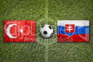 Turkey vs. Slovakia flags on soccer field
