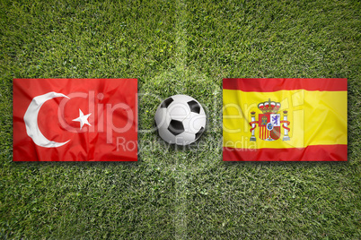 Turkey vs. Spain flags on soccer field