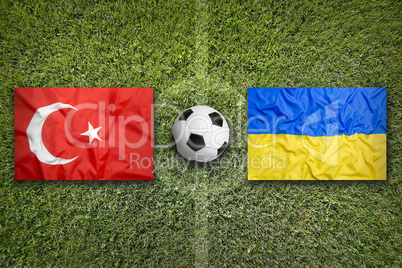 Turkey vs. Ukraine flags on soccer field