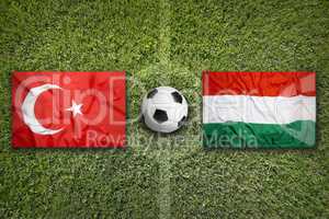 Turkey vs. Hungary flags on soccer field
