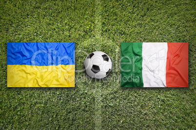 Ukraine vs. Italia flags on soccer field