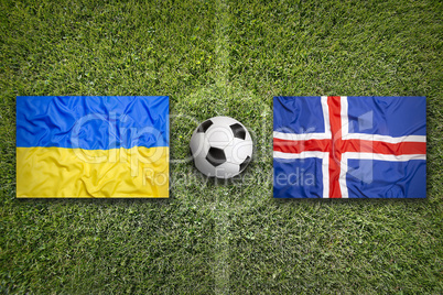 Ukraine vs. Iceland flags on soccer field