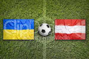 Ukraine vs. Austria flags on soccer field