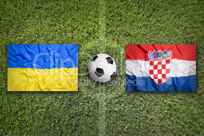Ukraine vs. Croatia flags on soccer field