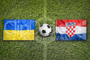 Ukraine vs. Croatia flags on soccer field