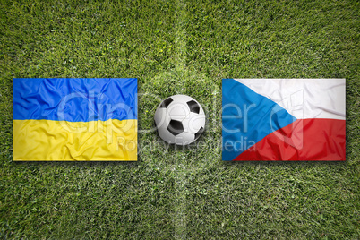 Ukraine vs. Czech Republic flags on soccer field