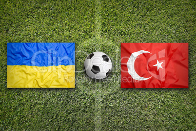Ukraine vs. Turkey flags on soccer field