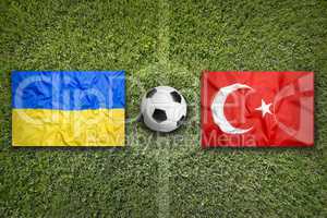 Ukraine vs. Turkey flags on soccer field