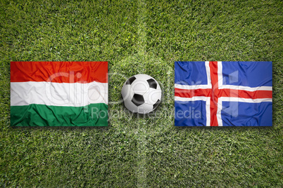 Hungary vs. Iceland flags on soccer field
