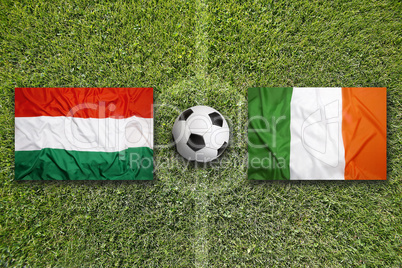 Hungary vs. Ireland flags on soccer field